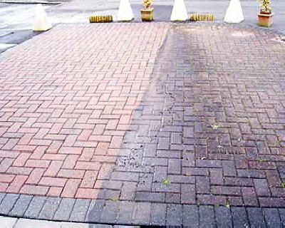 Paver patio half cleaned showing the difference pressure washing makes